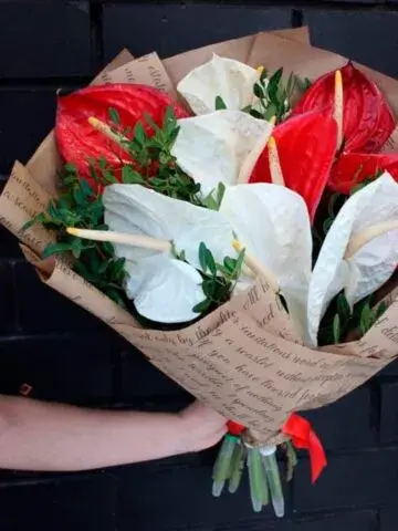 Bouquet of anthuriums in craft paper